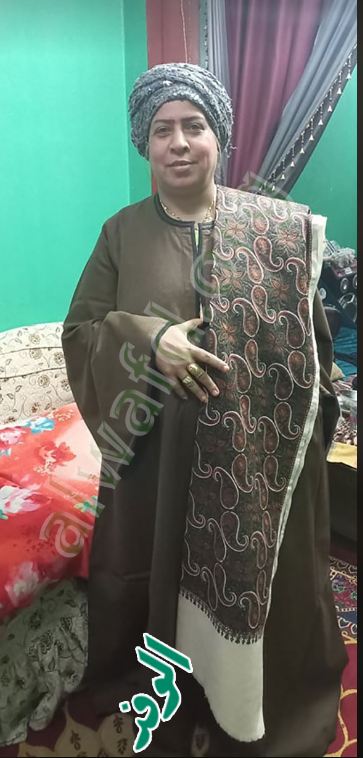 ملابس المعلمة عسلية